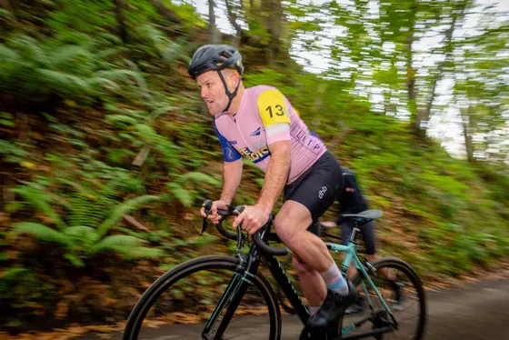 James Wright cycling on a country road